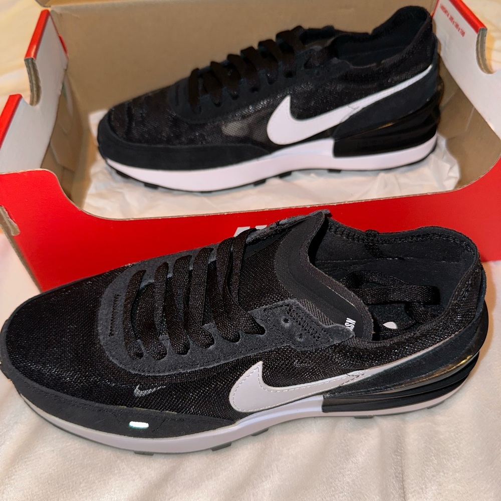 Womens black and white Nike waffle knit sneakers
